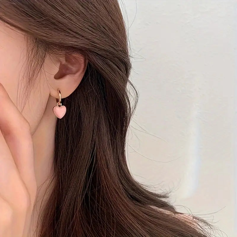 Örhängen med varm glans | Tillsammans mot bröstcancer